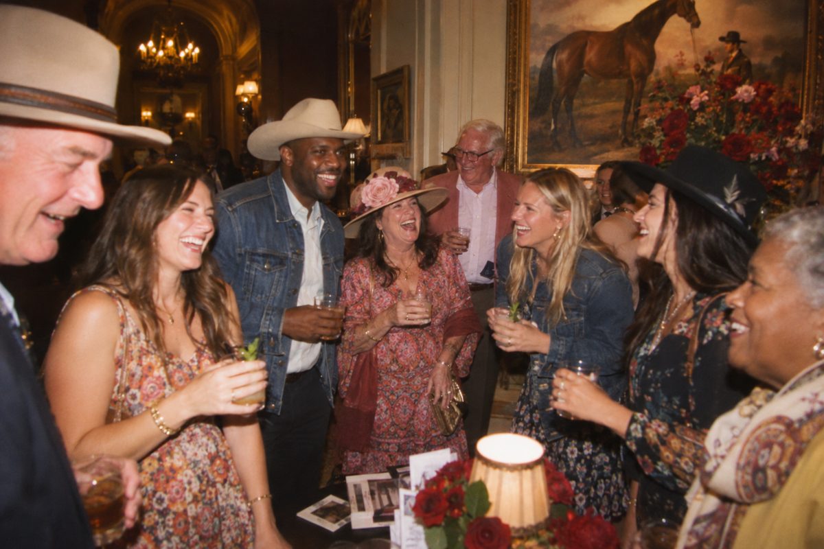 Guests toasting together at a Kentucky gathering